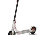an image of a scooter that is sitting on a white surface