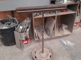 a machine that is sitting in a room with a lot of tools