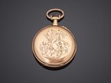 an antique gold pocket watch with a picture of a woman on it