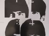 l'affiche des Beatles sur laquelle figurent les quatre visages des Beatles