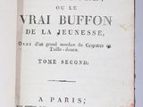 an open book with a black and white title on it