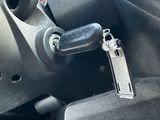 a close up of a steering wheel in a car