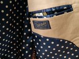 the back of a pair of pants with polka dots on them