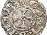 a close up of a coin on a white background