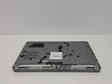 a laptop with a broken screen sitting on a table