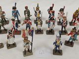 a lot of figurines of different sizes and colors