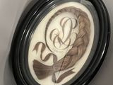 a picture of a clock with a picture of a woman on it