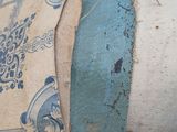 a close up of a piece of fabric with a sewing needle on it