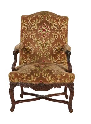 une image d'une chaise avec un dossier et des accoudoirs tapissés de fleurs