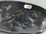 a close up of a metal object with a tag on it