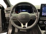 the interior of a car with a steering wheel, dashboard, and touch screen