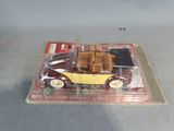 a toy car in a plastic box on a table