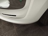 a close up of a car door with a handle on it