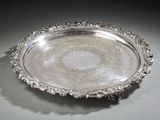 a silver plate that is sitting on a table