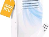 a small white air conditioner with a price tag on it