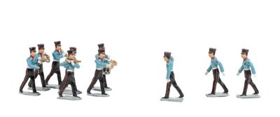 several figurines of a marching band are shown in a row