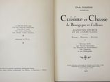 an open book that has a picture of a cat on it