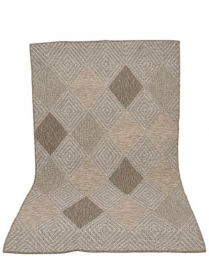 a brown and white rug with a diamond pattern on it