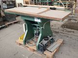 an image of a table sawing machine in a warehouse