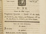 an open book with a picture of a crown on it