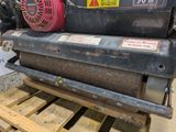 a machine that is sitting on top of a pallet