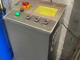 a machine that is sitting in the corner of a room