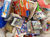 a pile of children ' s toys in a plastic bag