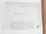 a piece of paper with writing on it sitting in a box