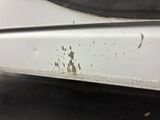 a close up of a car door with a lot of dirt on it