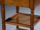 a wooden table with a marble top on it