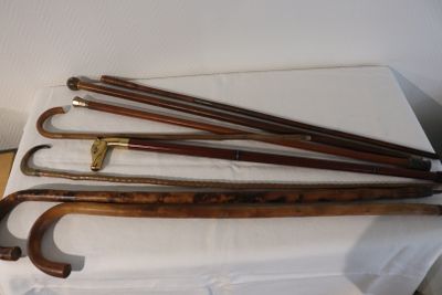 a lot of umbrellas that are sitting on a table