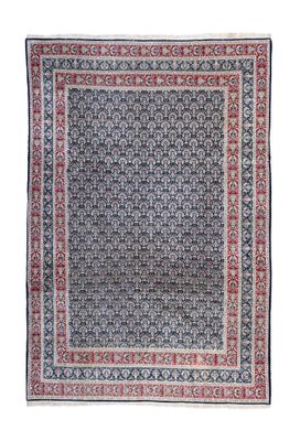 un tapis bleu et rouge sur fond blanc