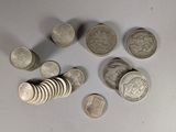 a lot of coins that are sitting on a table