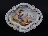 une image représentant une assiette sur laquelle figure le portrait d'un couple