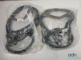 two pieces of wires wrapped in plastic on a table