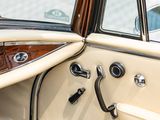 a close up of a car ' s interior with the door open