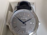 a watch that is sitting in a box on the table
