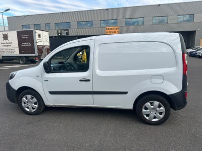 a white van that is parked in a parking lot