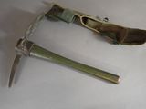 two tools that are sitting on a table