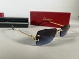a pair of sunglasses sitting on top of a table next to a box