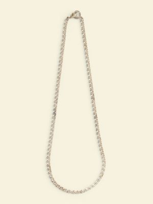 a close up of a silver chain on a white background