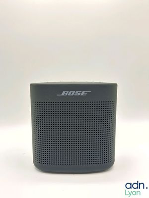 a close up of a bose bluetooth speaker on a white background