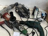 a lot of tools that are laying out on the floor