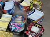 many different types of pokemon trading cards in the box