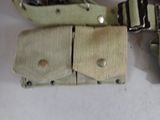 two belts and a belt with buckles on a table