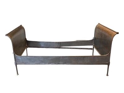 an image of a metal bed frame with a sleigh on it