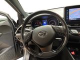 the interior of a car with a steering wheel, dashboard, and dash board