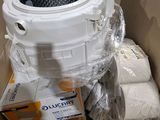 a cardboard box with a toilet in it that is packed with toilet paper