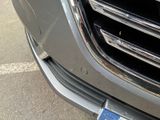 a close up of a car with a license plate attached to it