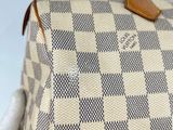 an image of a louis vuitton bag on a mannequin mannequin mannequin mannequin mannequin mannequin mann